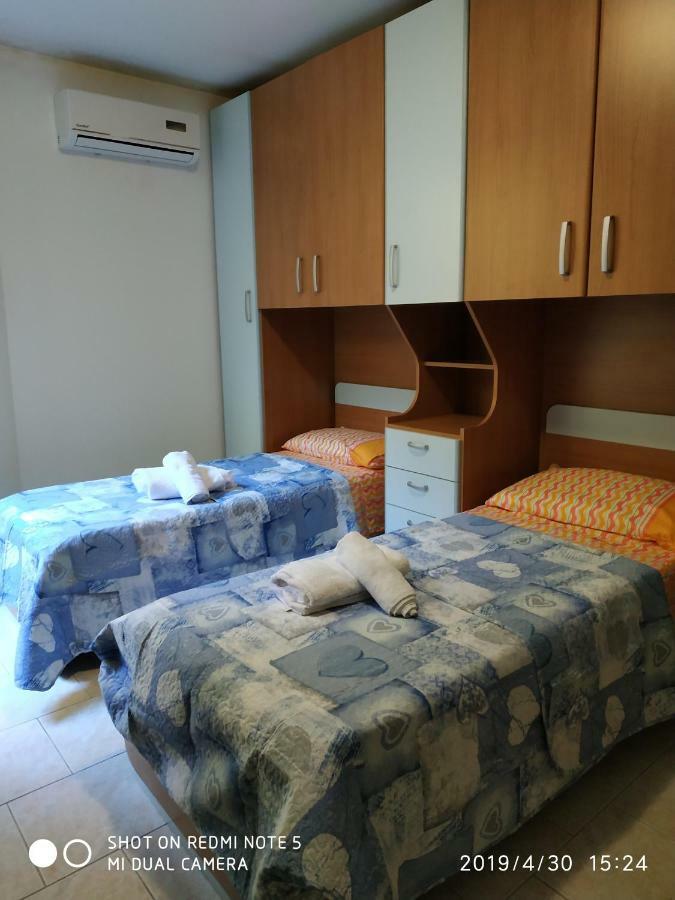 Apartamento Alma House Porto Torres Exterior foto